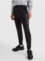 Black men's sweatpants with Tommy Hilfiger inscription - Men