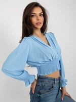 Light blue formal blouse with puffed sleeves