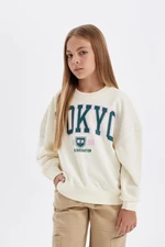 DEFACTO Girl Oversize Wide Pattern Crew Neck Printed Sweatshirt