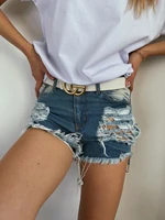 White denim shorts with holes