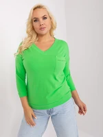 Light green cotton blouse of larger size