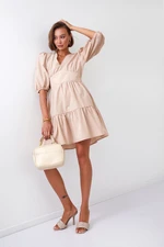 Waist dress with puffed sleeves of beige color