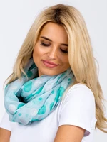 Green scarf with polka dots