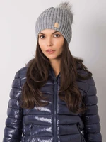 Gray cap with pompom