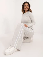 Grey tracksuit with fitted blouse