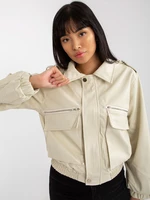 Light beige short eco-leather jacket with collar