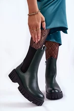 Leather women's boots on the platform green bente