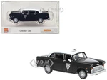 1974 Checker Cab Black and White "Winnipeg" 1/87 (HO) Scale Model Car by Brekina