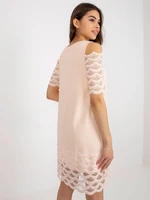 Peach cocktail dress with decorative sleeves