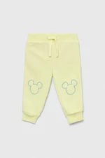 Detské tepláky GAP x Disney žltá farba, s potlačou