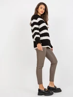 Black and ecru knitted oversize sweater with braids