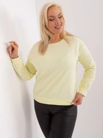 Light yellow plus size blouse with a round neckline