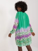 Green women's dress with colorful prints