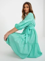 Mint flowing dress with ruffle and belt