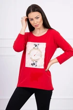 Blouse with 3D graphics with red pearls