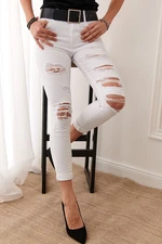 White denim jeans with holes