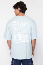 Trendyol Light Blue Oversize/Wide Cut Headlight East Printed 100% Cotton T-Shirt