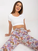 White and purple summer trousers made of fabric with SUBLEBEL pattern