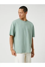 Koton Basic Oversize T-Shirt with a Crew Neck Short Sleeves.