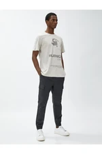 Koton Slogan Printed T-Shirt with Pocket Detail, Crew Neck, Short Sleeves.