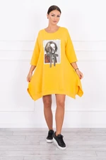 Dress with print and flowing bottom of mustard