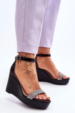 Fashionable leather sandals on a wedge black Arwen