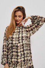 dress with a patterned print and a ruffle