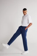 AC&Co / Altınyıldız Classics Unisex indigo štandardne strihané, flexibilné bavlnené tepláky s vreckami.