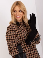 Black gloves with geometric pattern