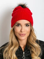 Red cap with hem and fur pompom