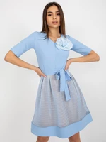 Light blue flowing cocktail dress with belt