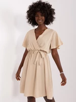 Beige dress with belt