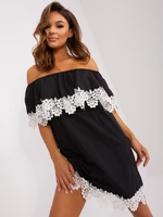 Black dress with Spanish neckline