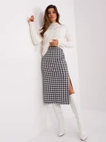 White and black knitted skirt with slits