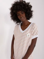 Women's white-beige striped blouse with brooch