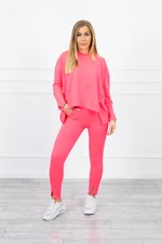 Complete with oversize blouse pink neon color