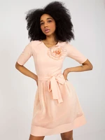 Peach cocktail dress with belt