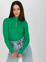 Lady's green ribbed turtleneck blouse