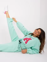 Mint and fluo pink tracksuit with letter A