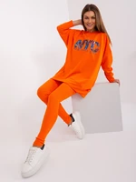 Orange two-piece set with leggings