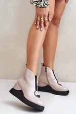 Lacquered wedge ankle boots insulated with D&A beige