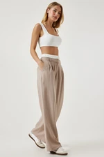 Happiness İstanbul Women's Beige Contrast Waist Detailed Striped Woven Trousers