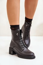 Insulated ankle boots with heels made of black vinceza leather