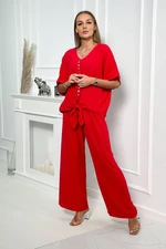 Blouse set with red trousers