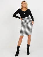 Black and white woolen skirt made of tweed pencil