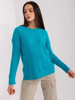 Turquoise sweater with cables and cuffs