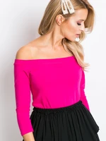 Fuchsia blouse on shoulder