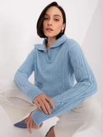 Light blue sweater with cables and collar