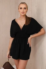 Black jumpsuit with ruffled waistband