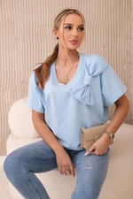 Cotton blouse with a decorative bow in blue color